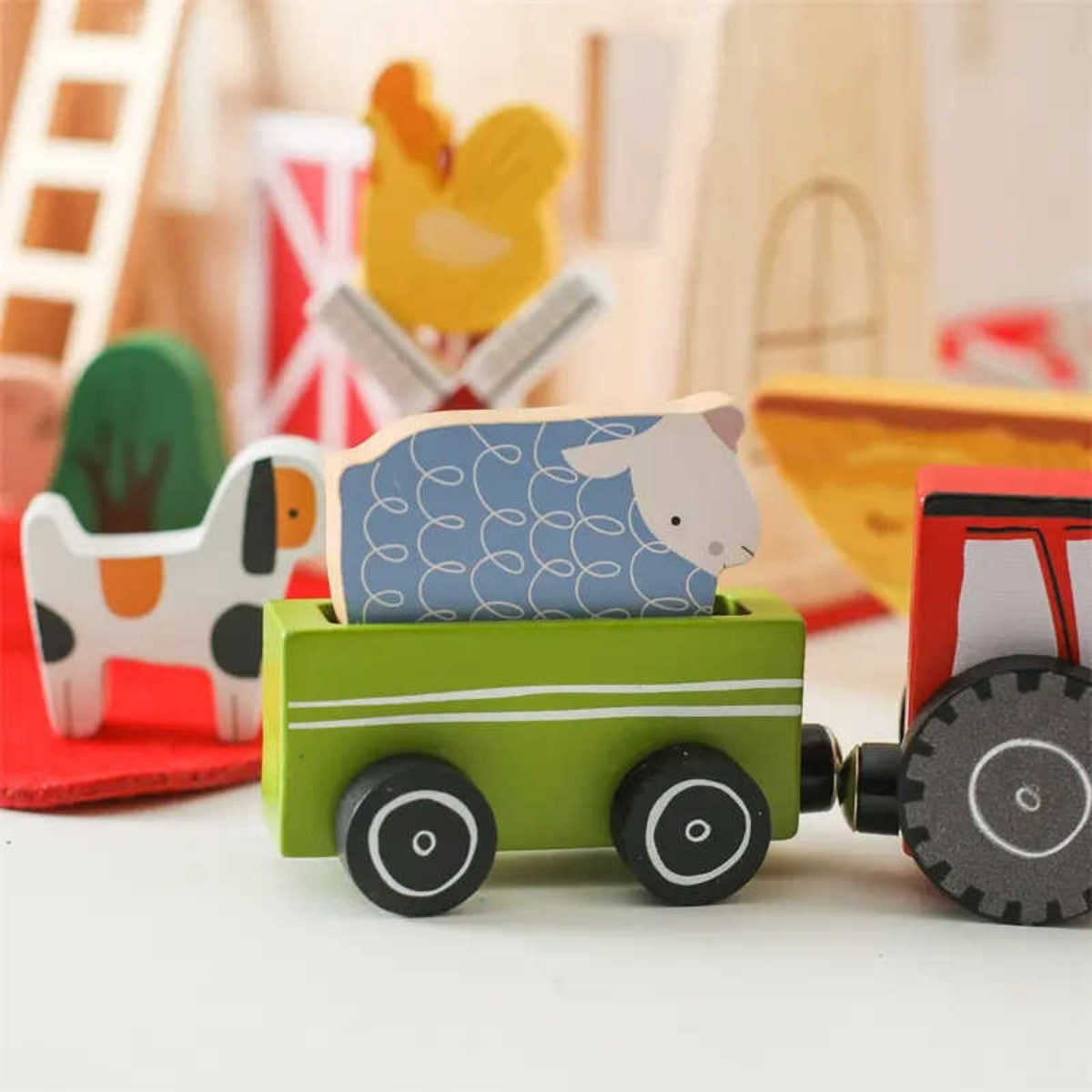 Wooden sheep figure inside Montessori train wagon with magnetic connector