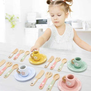 Girl playing with Montessori wooden kitchen accessories to develop imaginative skills