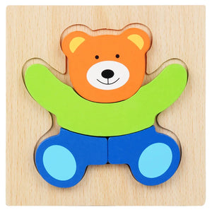 Wooden bear puzzle with orange, green, and blue pieces on a wooden base