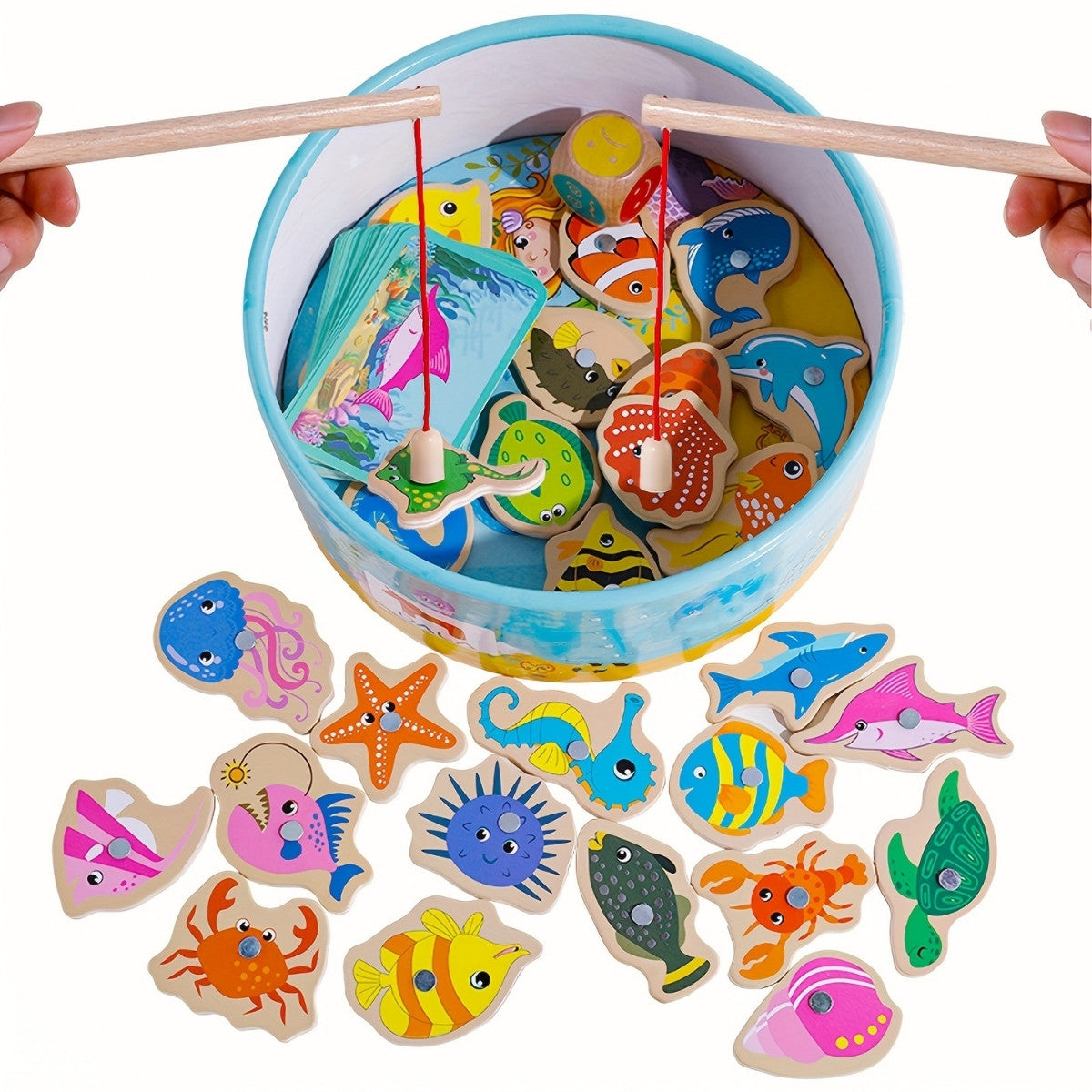 Using magnetic fishing rod to catch colorful wooden fish for preschool pretend play
