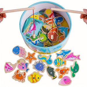 Using magnetic fishing rod to catch colorful wooden fish for preschool pretend play