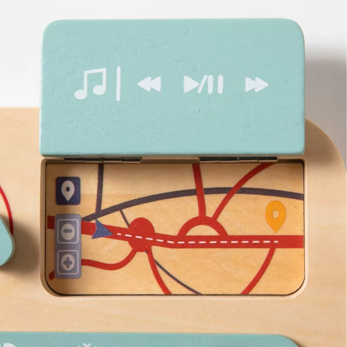 Montessori wooden busy car board on neutral background for early childhood learning