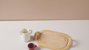 Video showing Montessori tea set details, materials, and how to play with the silicone and wooden pieces